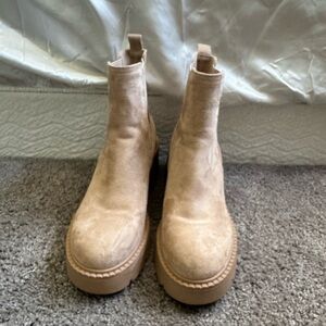 Women’s size nine beige heeled boot.